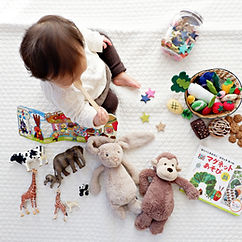 Toddler with Toys