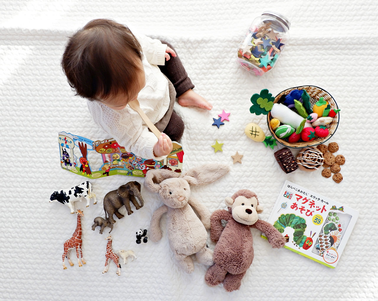 Toddler with Toys