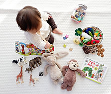 Toddler with Toys