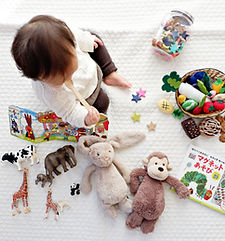 Toddler with Toys