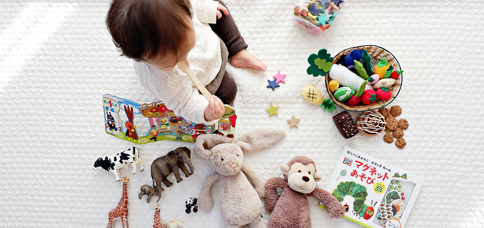 Toddler with Toys