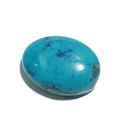 Oval turquoise gemstone with rich blue color with natural pattern
