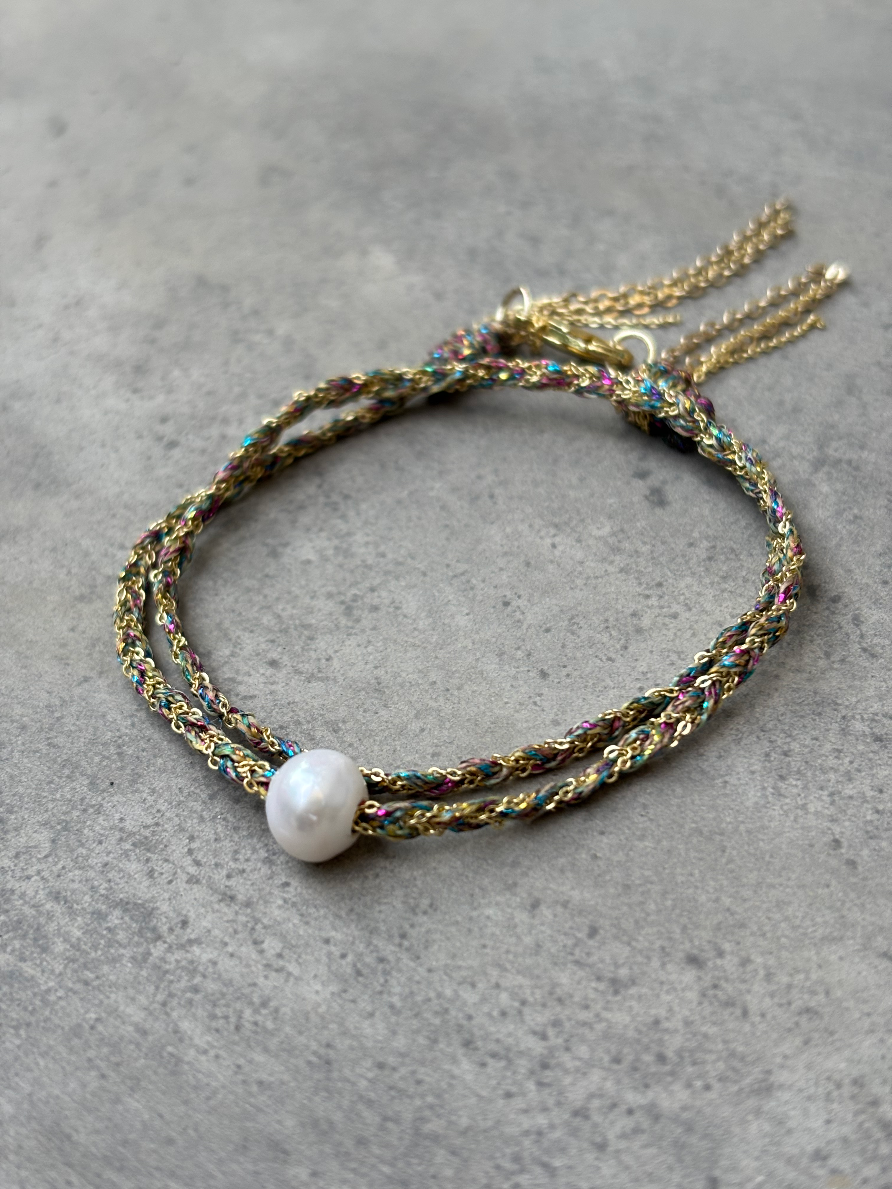 צמיד זהב סרוג עם פנינה