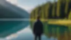 Eye-level view of a person standing by a serene lake, reflecting on life.