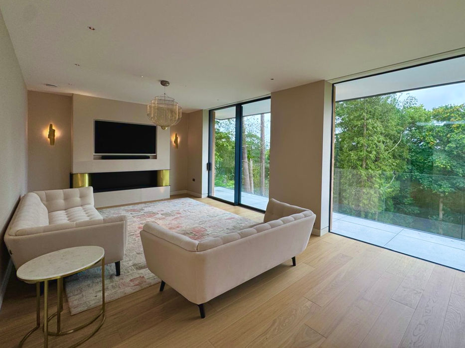 Modern light filled lounge extension, connected to garden