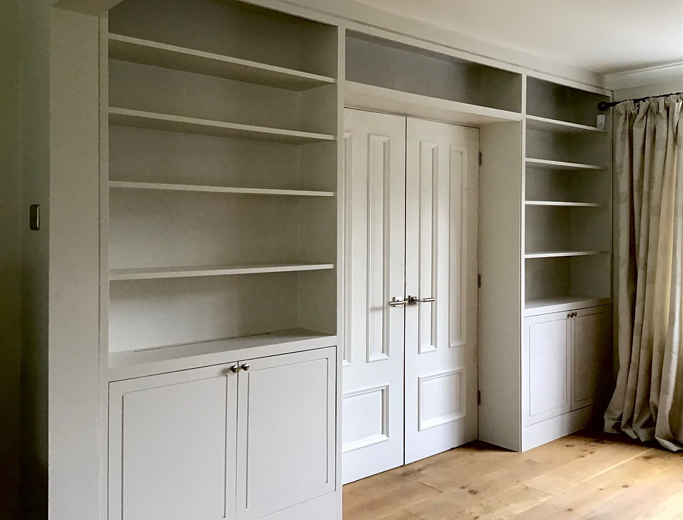 Bespoke joinery library bookcase around central doorway