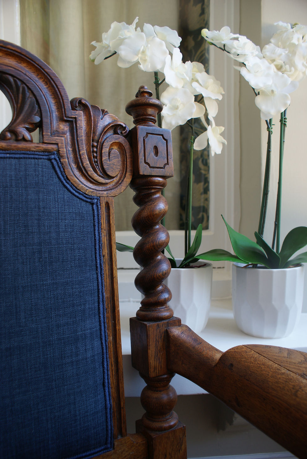 Interior Design Detail antique chair and orchid