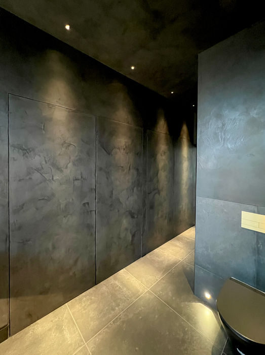 Modern bathroom wall finish and lighting details