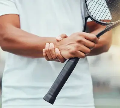 closeup-of-unknown-indian-tennis-player-suffering-from-wrist-injury-in-court-game-ethnic-f