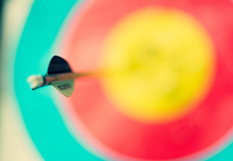 Colorful target with arrow in the center to represent the focus on a mid-year reset