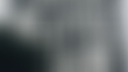 Side of building painted black and white reading "You & Me...Me & You" to symbolize authentic community