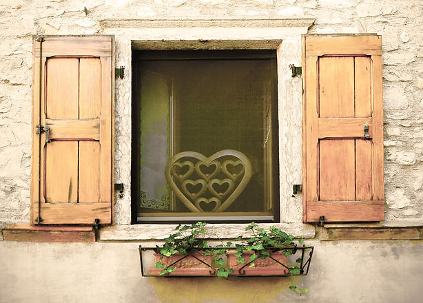 Italian%20style%20window%20with%20wooden%20shutters%20decorated%20with%20fresh%20flowers_edited.jpg