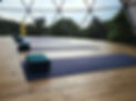Yoga mats and blocks in geodesic dome