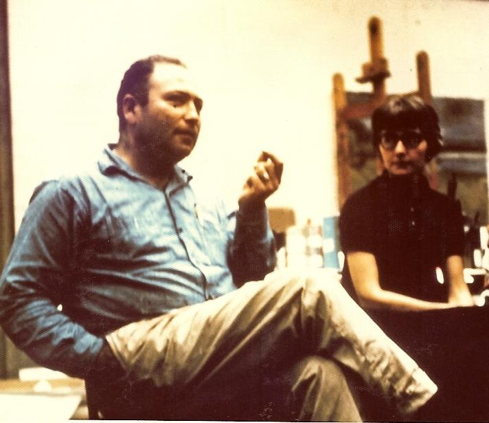 Jules Olitski at Emma Lake Artists' Workshop. Artist Mina Forsyth sits beside him. Photo Credit: Kenneth Lochhead.