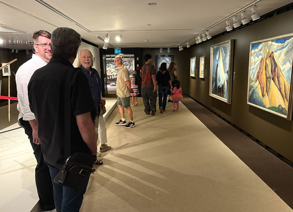 Paul, John, Roald, and Lori viewing the Lawren Harris and Bess Harris.