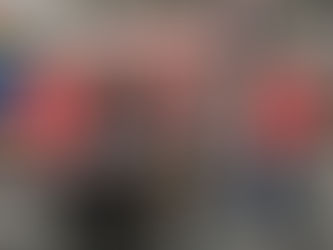 Quantum Land Design team at ConExpo-Con/AGG booth, promoting GPS models and drone data solutions for earthmoving and construction technology ahead of ConExpo 2026.