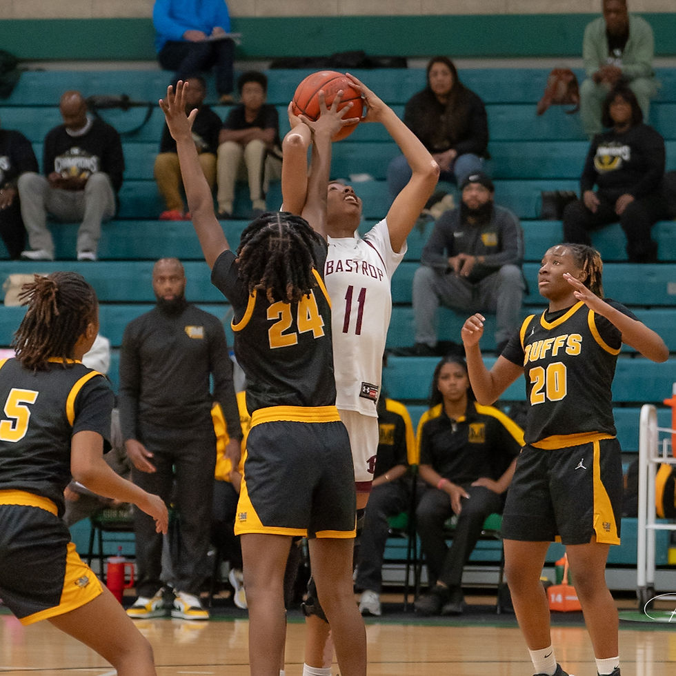 Bastrop's Keyaira Limuel shoots in a crowd