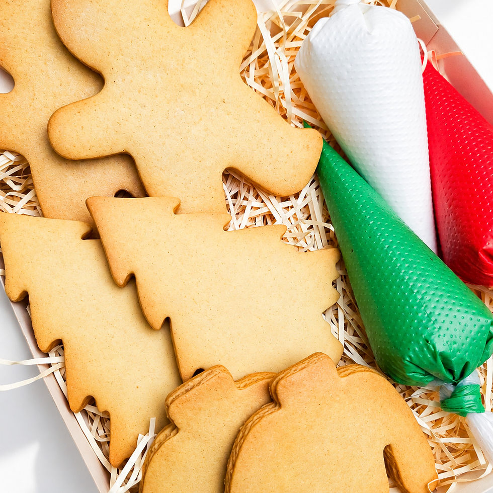 Christmas biscuit decorating box with cookies and colourful icing