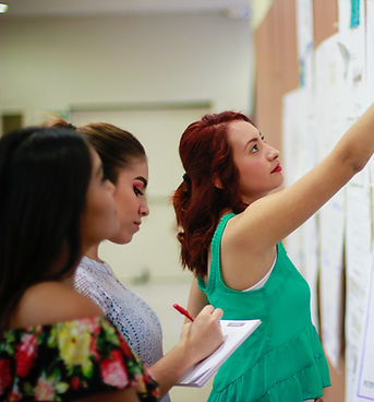 woman pointing at paper_edited.jpg