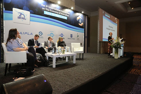 Heidi speaking at a conference