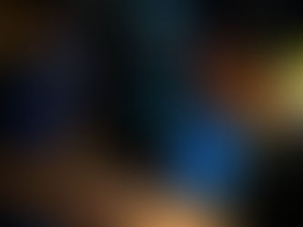 Coach Bryan congratulates Athlete Marc with a handshake and smiles after his podium performance.