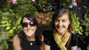 Photo of two women in botanical greenhouse
