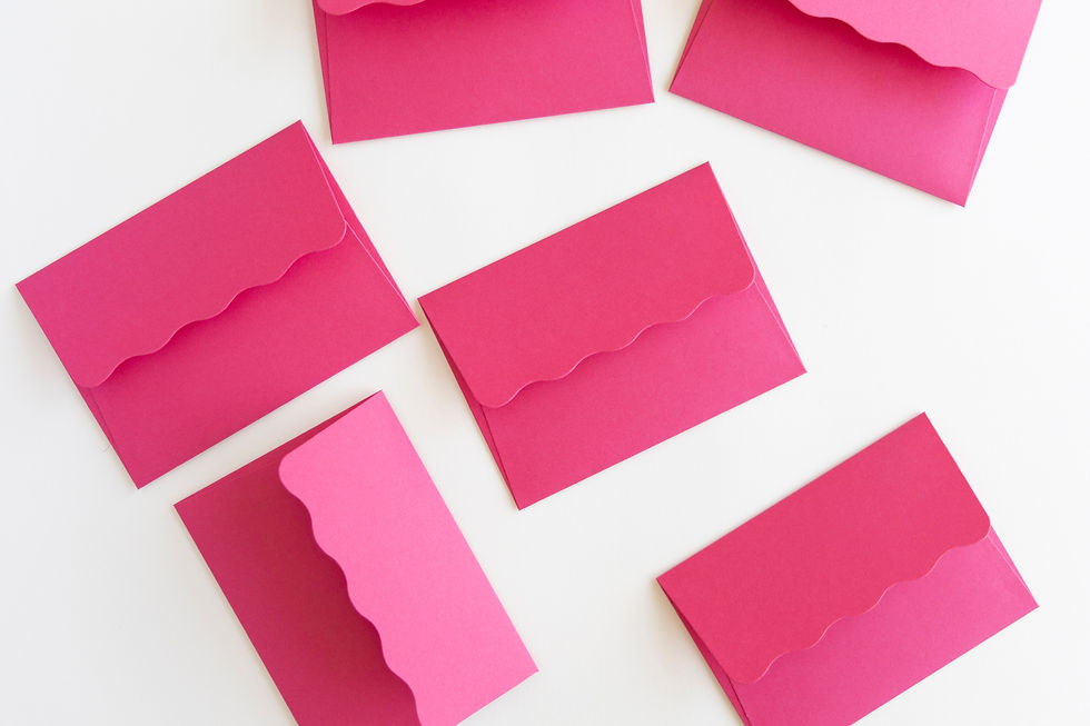Wave style envelopes shown in hot pink.
