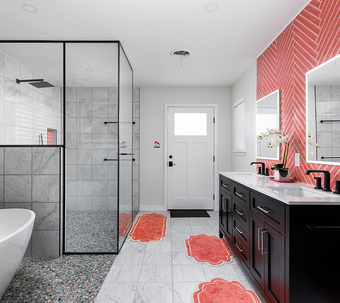 Presenting a luxurious bathroom oasis in University Hills, featuring sleek design and vibrant colors. Check out photos showcasing the intricate plumbing, foundation work, and framing details!