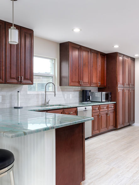 Kitchen, Bathroom, Flooring, Windows and Doors Building Supplies interior designed to a traditional style.