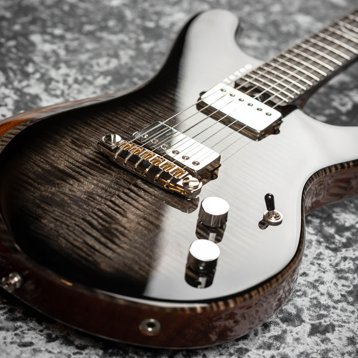 A shiny electric guitar with great details. Perfect for playing music. My Site
