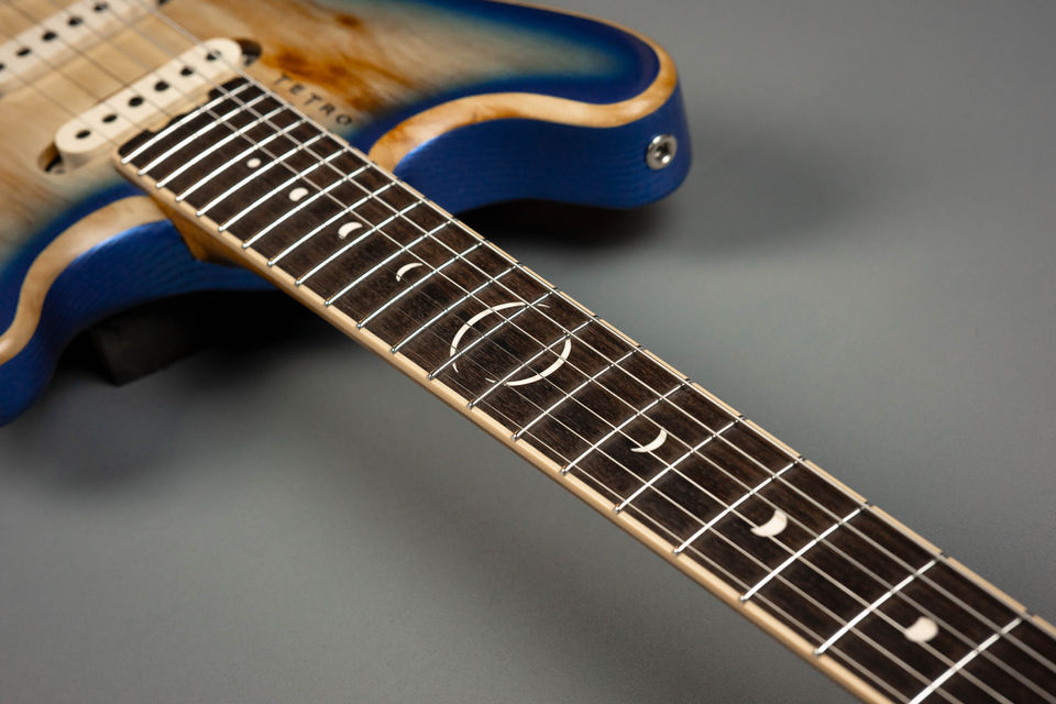 Electric guitar with unique fretboard inlays, blue and tan finish, My Site