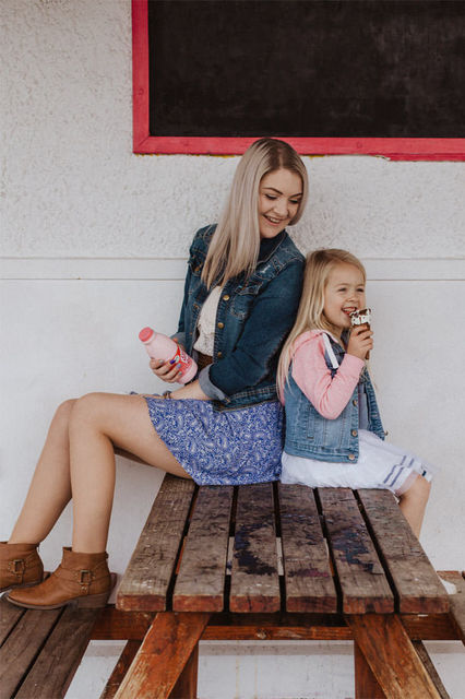 Mum and daughter sharing an ice cream at the dairy