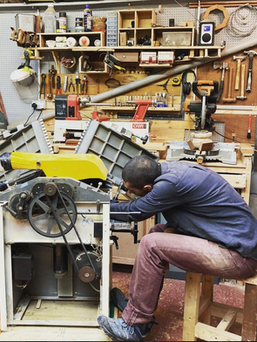 Alex in workshop.png