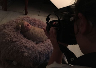 Behind the scenes of a newborn baby photo session