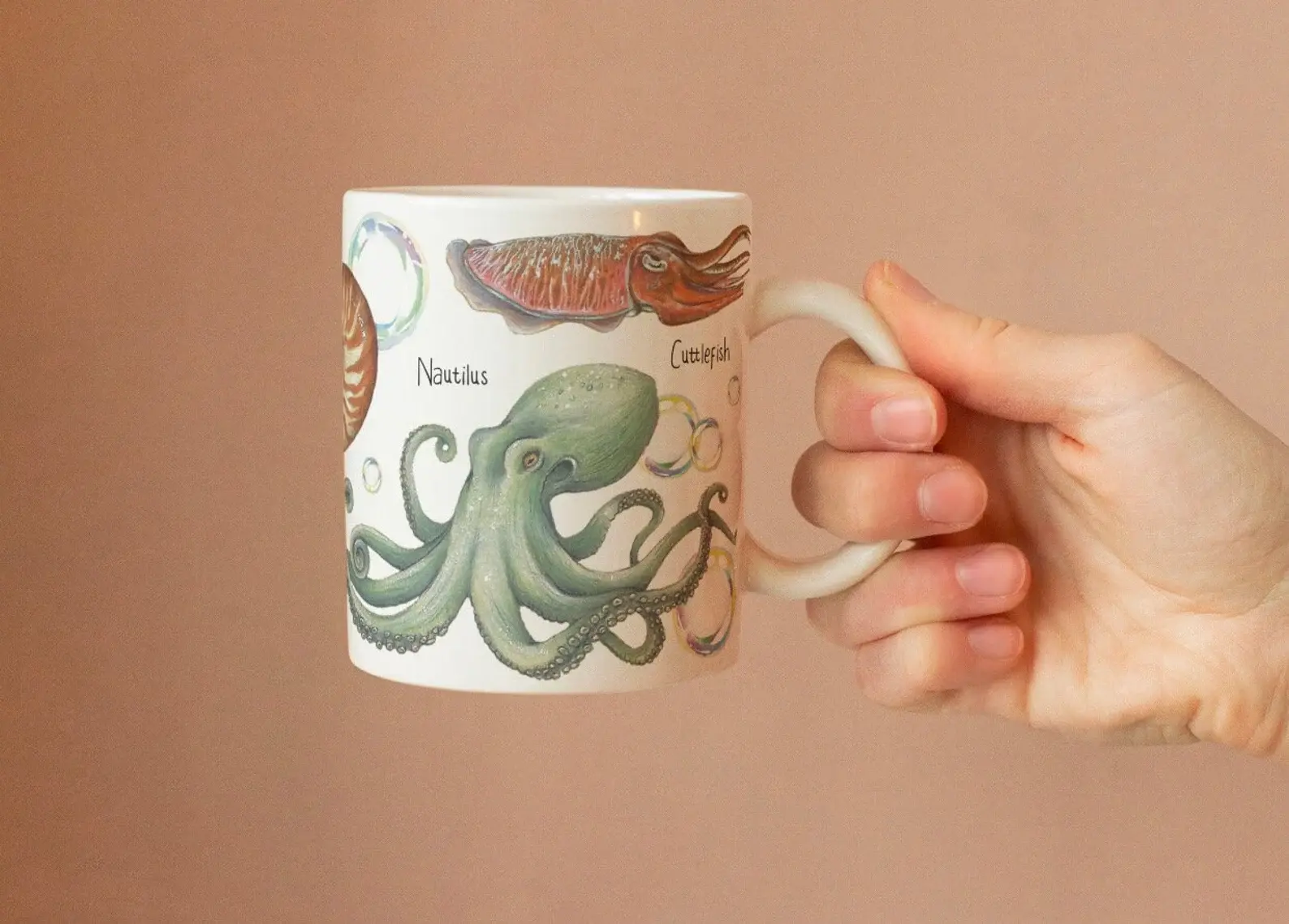 Cephalopod mug held in hand