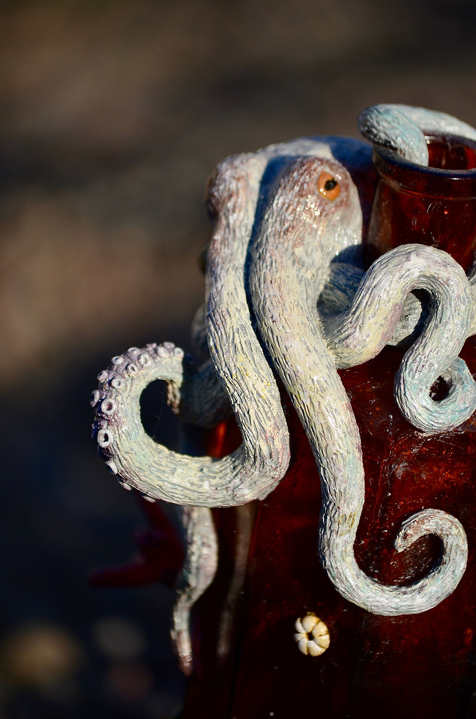 Thumbnail: ‘Milton’ - Octopus reef sculpture on vintage glass bottle close up of octopus