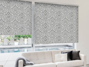 A patterned own fabric roller blind