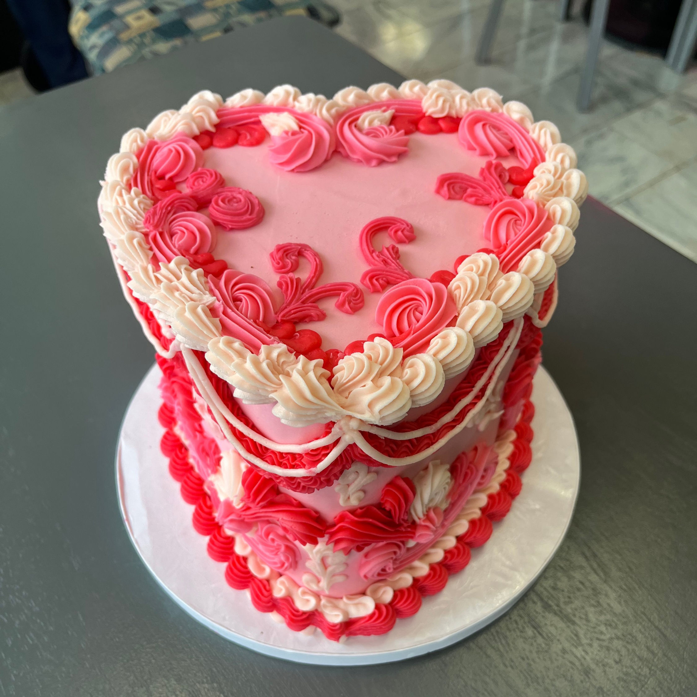 The Heart Cake, this signature cake comes in pink, white, yellow or teal