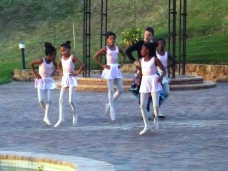 Little ballerinas rehearsing with their ballet teacher for a balet demonstration in Sir Lowry's Pass