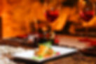 romantic-salmon-steak-dinner-with-red-wine-SBI-301087065.jpg