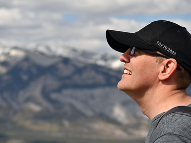 Profile of man on top of mountain