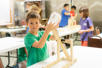 Students building and testing a STEM engineering project at RHSA