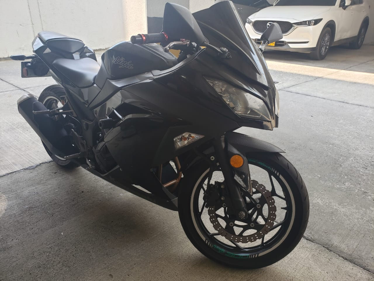 Kawasaki ninja modelo, 2014,2 dueño,35.000 klm. Como nueva todo al día 