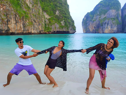 Friends posing at Maya Bay to contact Phi Phi Island Tours.