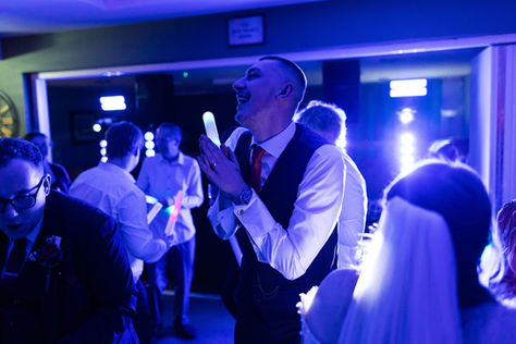 Guests partying with DJ at 60th birthday