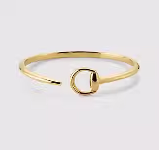 795810_J8500_8000_001_100_0022_Light-18k-Horsebit-cuff-bracelet.avif