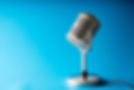 65203aad60acf35322e7706c_Microphone_with_blue_background.jpeg