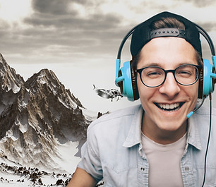 Young Man with Headphones Playing Video Game