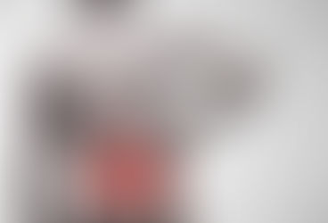 What are the benefits of seeing a massage therapist or remedial therapist for pain management?