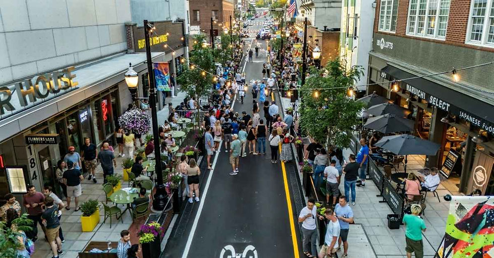 black fencing along a busy street in stamford, ct